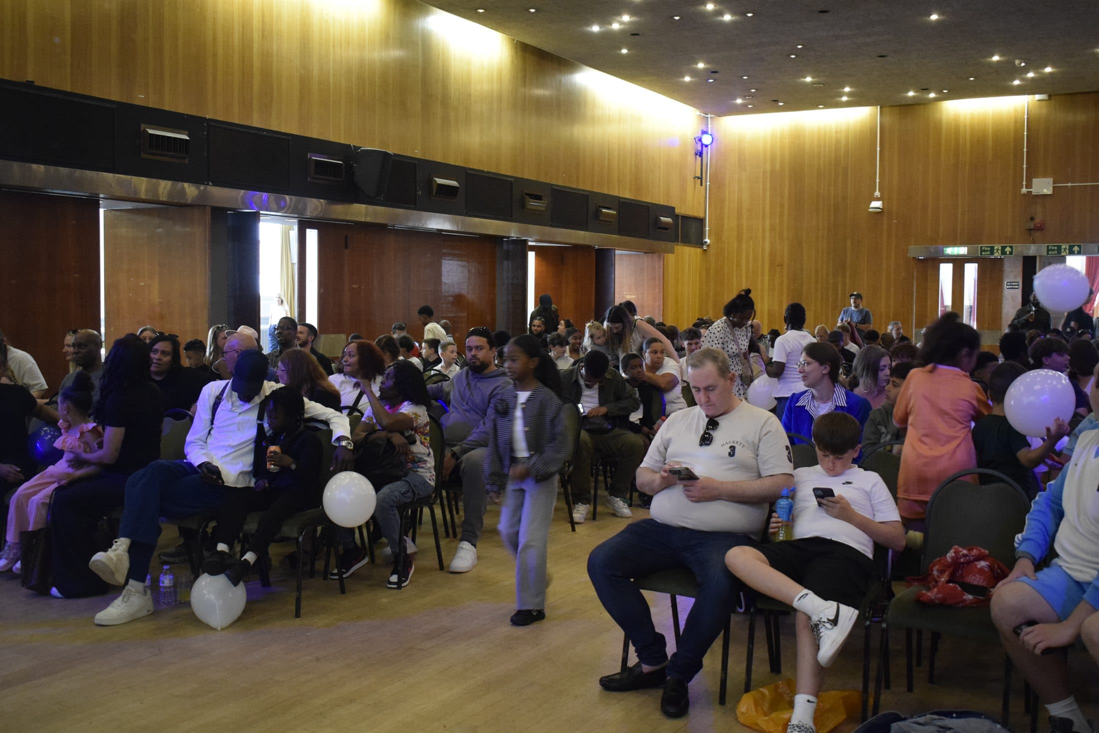 A packed community awards night room